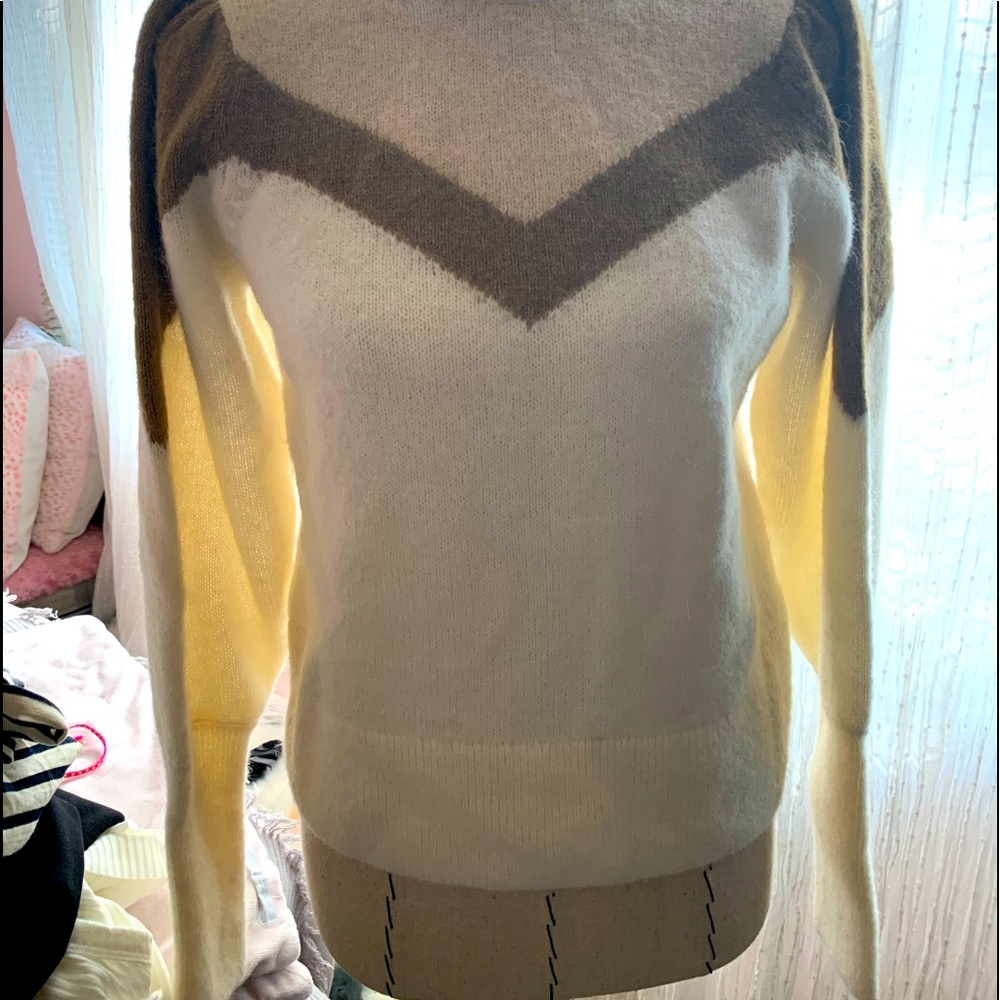 Beautiful cream sweater with hints of brown